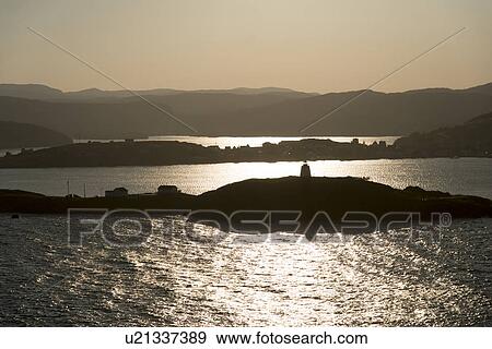 Stock Photo - Sunset over Trinity Bay, Skerwink Trail, Trinity, Bonavista Peninsula, Newfoundland And Labrador, Canada. Fotosearch