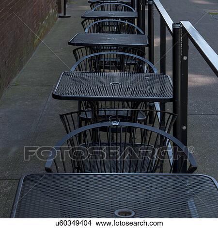 Tables and chairs at a sidewalk cafe, Pioneer Square, Seattle, Washington State, USA View Large Photo Image Picture - Tables and chairs at a sidewalk cafe, Pioneer Square, Seattle, Washington State, USA. Fotosearch
