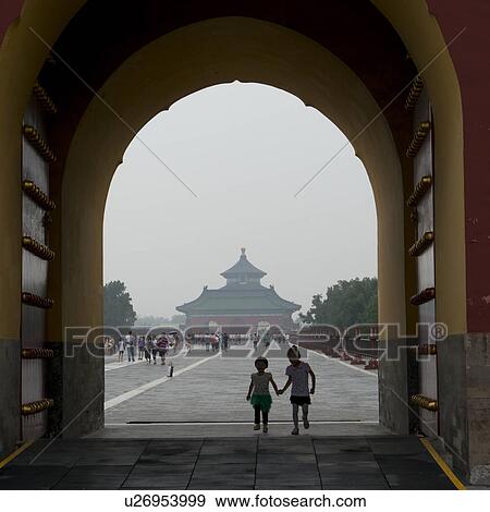 Stock Photo - Tourists at a temple, Imperial Vault Of Heaven, Temple Of Heaven, Dongcheng, Beijing, China. Fotosearch