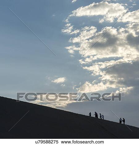 Tourists at Mingsha Shan, Dunhuang, Jiuquan, Gansu Province, China View Large Photo Image Stock Photography - Tourists at Mingsha Shan, Dunhuang, Jiuquan, Gansu Province, China. Fotosearch