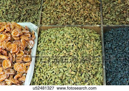 Varieties of dried fruit and nuts in market, Dong Dajie, Dunhuang, Jiuquan, Gansu Province, China View Large Photo Image Stock Photo - Varieties of dried fruit and nuts in market, Dong Dajie, Dunhuang, Jiuquan, Gansu Province, China. Fotosearch