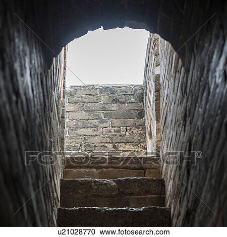 Stock Image - View of steps ascending from brick arch along wall at Jinshanling section of Great Wall Of China, Beijing, China. Fotosearch