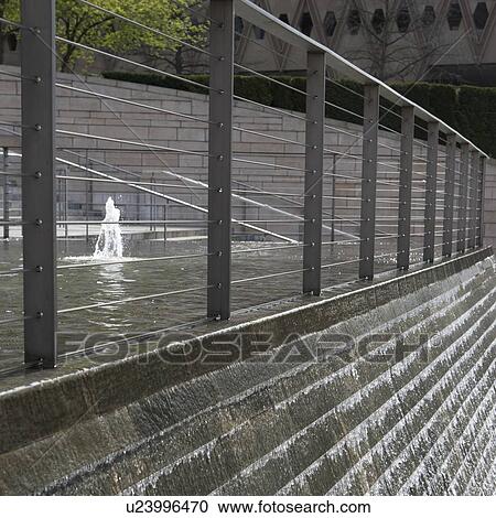 Stock Image - Water flowing from a fountain, Seattle, Washington State, USA. Fotosearch