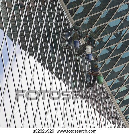 Stock Photo - Window washers cleaning windows of Seattle Central Library, Seattle, Washington State, USA. Fotosearch