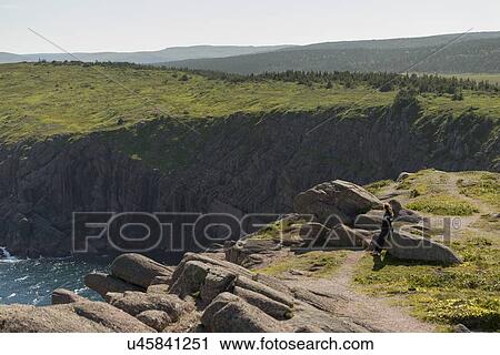 Woman at Cape Spear, St. John's, Newfoundland And Labrador, Canada View Large Photo Image Stock Image - Woman at Cape Spear, St. John's, Newfoundland And Labrador, Canada. Fotosearch