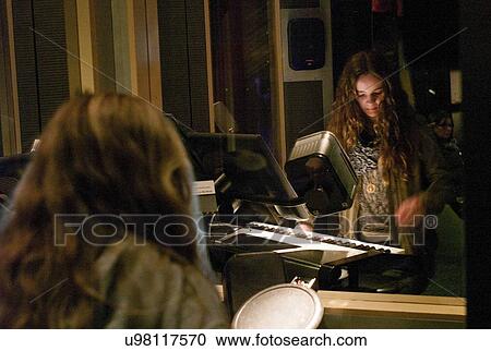 Woman playing piano at EMP Museum, Seattle, Washington State, USA View Large Photo Image Stock Image - Woman playing piano at EMP Museum, Seattle, Washington State, USA. Fotosearch