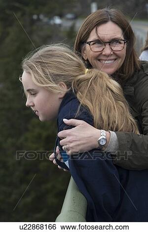 Stock Photograph - Woman smiling with her daughter, Deception Pass State Park, Oak Harbor, Washington State, USA. Fotosearch