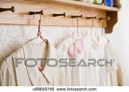 Antique shirts on hangers View Large Photo Image Stock Photograph - Antique shirts on hangers. Fotosearch