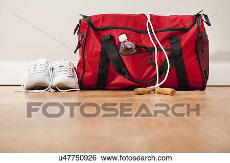 Stock Photograph - Bag and trainers. Fotosearch