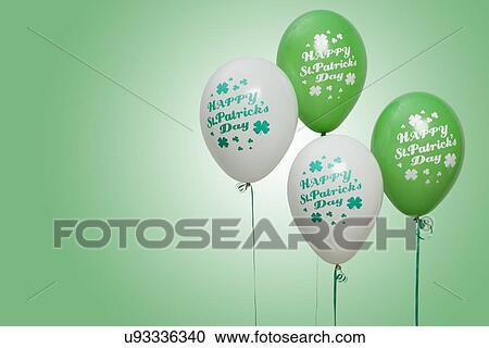 Stock Image - Balloons for celebrating St Patrick's Day. Fotosearch