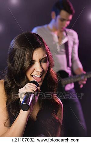 Band playing on stage View Large Photo Image Stock Image - Band playing on stage. Fotosearch