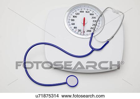 Bathroom scale and stethoscope View Large Photo Image Picture - Bathroom scale and stethoscope. Fotosearch