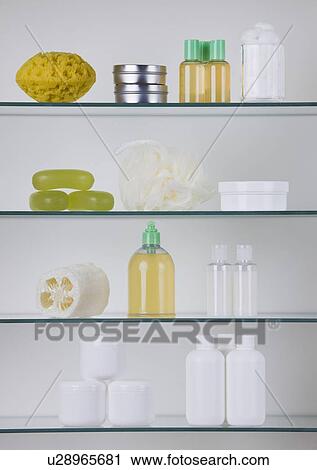 Stock Image - Bathroom shelves with cosmetics. Fotosearch