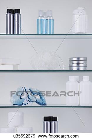 Bathroom shelves with cosmetics View Large Photo Image Stock Photo - Bathroom shelves with cosmetics. Fotosearch