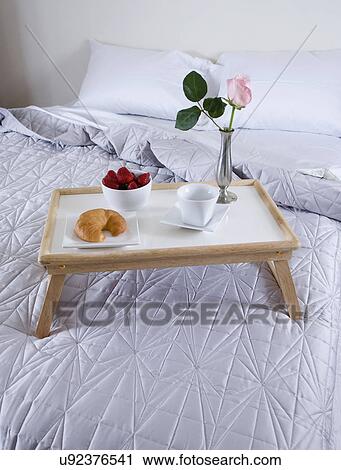 Breakfast tray on bed View Large Photo Image Stock Image - Breakfast tray on bed. Fotosearch
