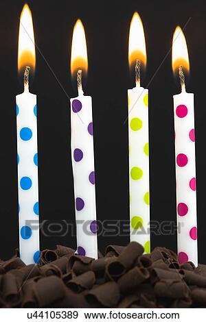 Burning candles on cake View Large Photo Image Stock Photo - Burning candles on cake. Fotosearch