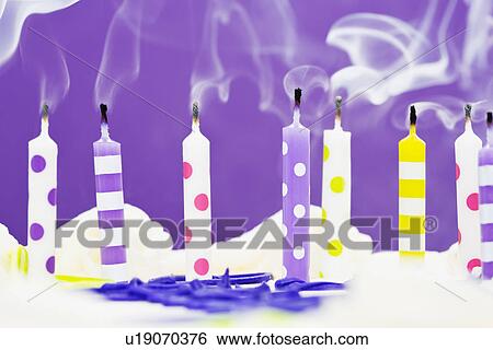 Burning candles on cake View Large Photo Image Stock Photograph - Burning candles on cake. Fotosearch