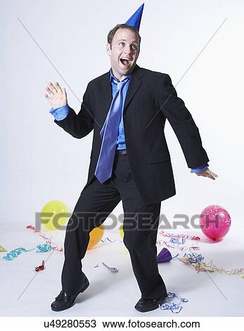 Businessman celebrating party View Large Photo Image Stock Image - Businessman celebrating party. Fotosearch