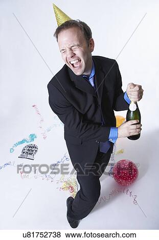 Stock Photo - Businessman celebrating party with champagne. Fotosearch