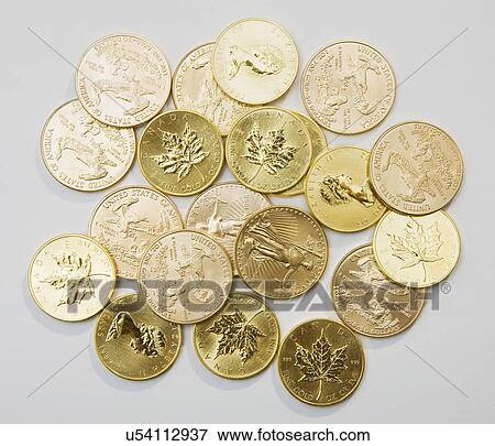 Canadian coins on white background View Large Photo Image Stock Photo - Canadian coins on white background. Fotosearch