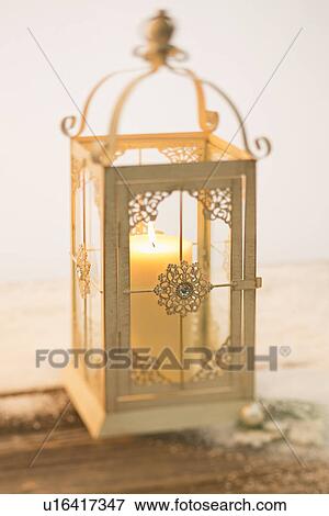 Candle in lantern View Large Photo Image Stock Photo - Candle in lantern. Fotosearch