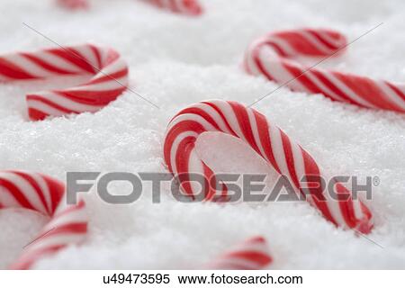 Candy canes in snow View Large Photo Image Stock Photography - Candy canes in snow. Fotosearch