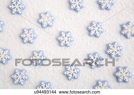 Picture - Candy snowflakes on white background. Fotosearch