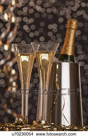 Picture - Champagne in champagne flutes. Fotosearch