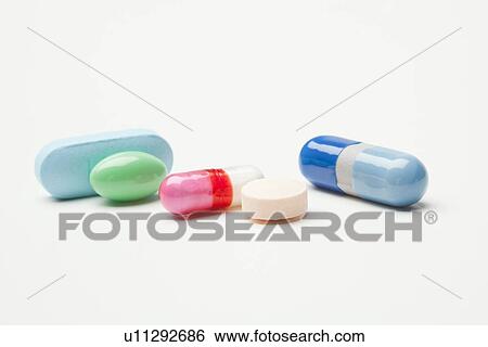 Stock Photograph - Choice of medicines on white background, studio shot. Fotosearch