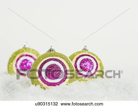 Christmas baubles on snow View Large Photo Image Stock Image - Christmas baubles on snow. Fotosearch