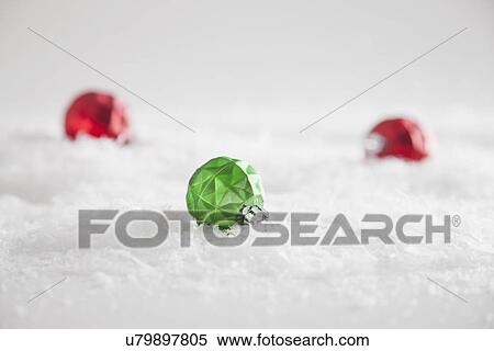 Christmas baubles on snow, studio shot View Large Photo Image Stock Photography - Christmas baubles on snow, studio shot. Fotosearch