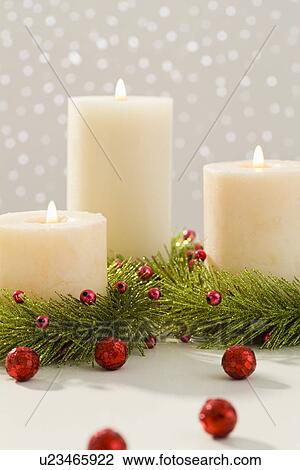 Stock Image - Christmas candles. Fotosearch