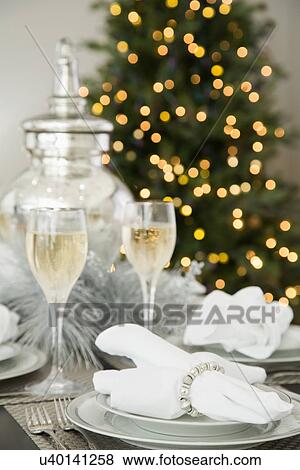 Christmas table setting View Large Photo Image Stock Photo - Christmas table setting. Fotosearch