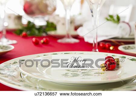 Christmas table setting View Large Photo Image Stock Photo - Christmas table setting. Fotosearch