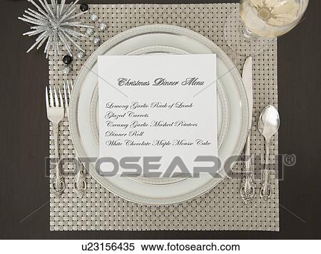 Christmas table setting View Large Photo Image Stock Photography - Christmas table setting. Fotosearch