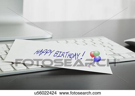 Close-up of birthday card on keyboard View Large Photo Image Picture - Close-up of birthday card on keyboard. Fotosearch
