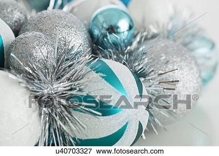 Close up of blue and silver Christmas ornaments View Large Photo Image Stock Photo - Close up of blue and silver Christmas ornaments. Fotosearch