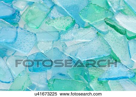 Close up of blue glass pebble, Studio shot View Large Photo Image Stock Photography - Close up of blue glass pebble, Studio shot. Fotosearch