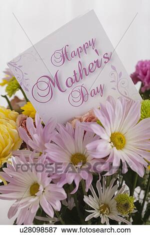 Stock Photo - Close up of bouquet and greeting card for Mother's Day. Fotosearch