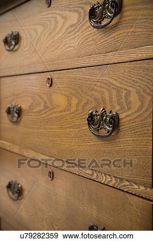 Close-up of chest of drawers View Large Photo Image Stock Photo - Close-up of chest of drawers. Fotosearch