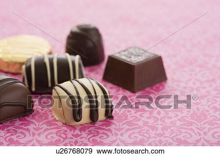 Close-up of chocolates View Large Photo Image Stock Photo - Close-up of chocolates. Fotosearch