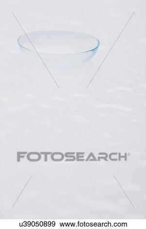 Stock Photo - Close-up of contact lens, studio shot. Fotosearch