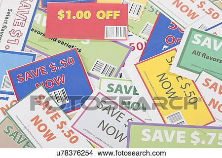 Close-up of coupons on table View Large Photo Image Picture - Close-up of coupons on table. Fotosearch