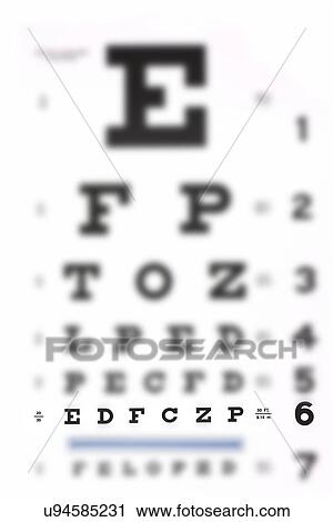 Stock Image - Close up of defocused eye chart, studio shot. Fotosearch