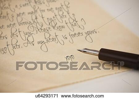 Stock Image - Close-up of love letter and fountain pen. Fotosearch