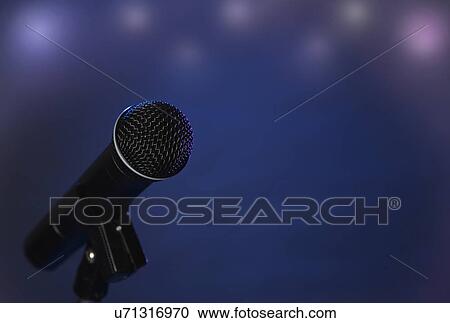 Close-up of microphone on stage with copy space View Large Photo Image Stock Image - Close-up of microphone on stage with copy space . Fotosearch
