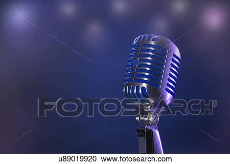 Stock Image - Close-up of microphone on stage with copy space . Fotosearch