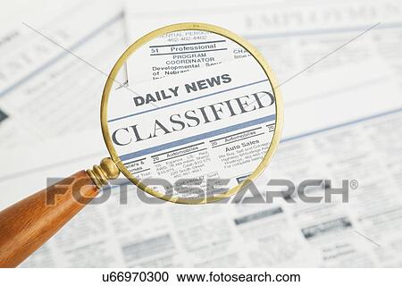 Close-up of newspaper page seen through magnifying glass View Large Photo Image Stock Image - Close-up of newspaper page seen through magnifying glass. Fotosearch