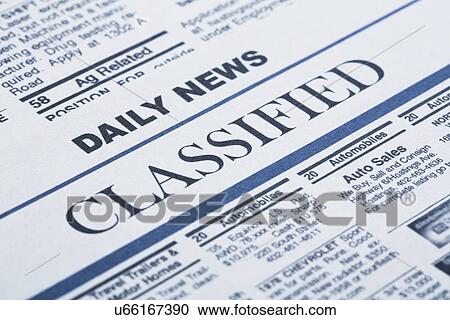 Stock Image - Close-up of newspaper page. Fotosearch