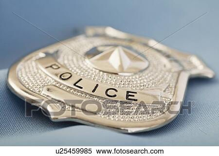 Close-up of police badge View Large Photo Image Stock Photography - Close-up of police badge. Fotosearch